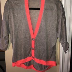 Cut crew top two-toned; backside longer